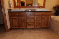 Thumb vanity  rustic style  knotty hickory   medium color  raised panel  double sink  standard overlay