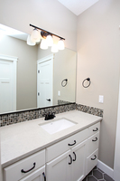 Thumb vanity  traditional style  painted  recessed panel  single sink  bank of drawers  full overlay