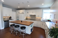Thumb kitchen  contemporary style  painted  slab door  island overhang  corner sink  retro  all one height  full overlay