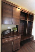 Thumb misc  contemporary style  quartersawn walnut  dark color  banded door  cubbies  lockers  coat hooks  drop off station  bench  full overlay  2 